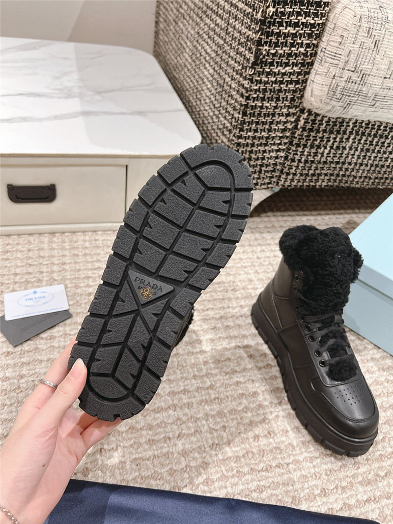 Pra*a black leather high top winter platform sneakers