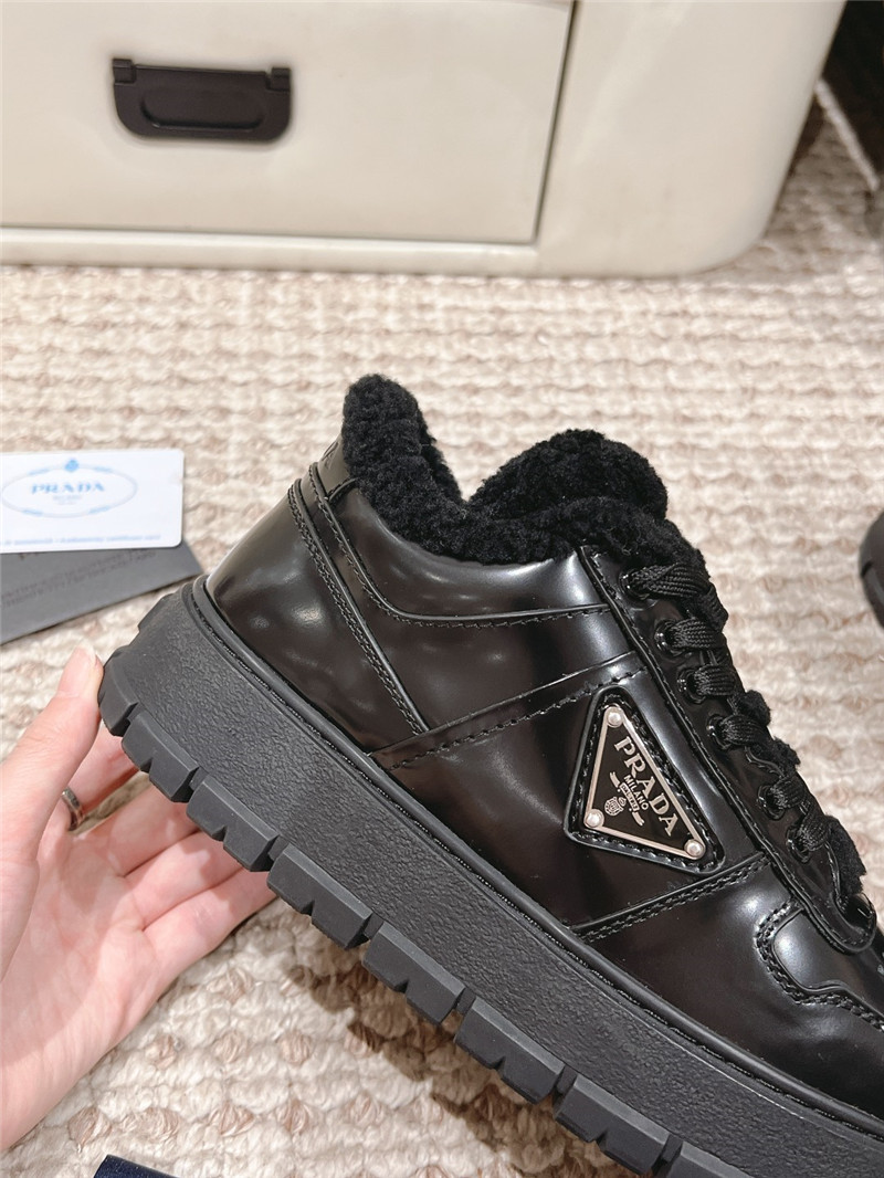 Pra*a black patent leather winter sneakers