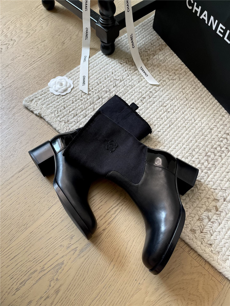 Ch**el black calfskin mid calf boots