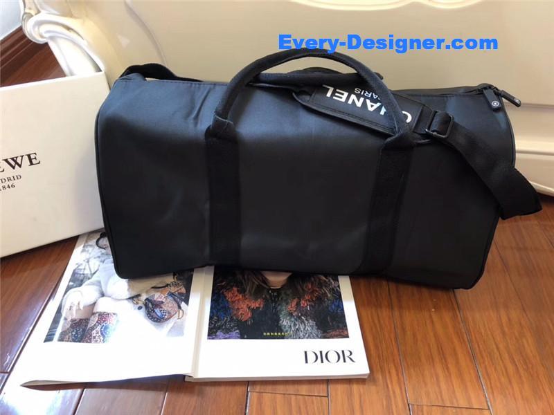 Ch**el logo luggage bag