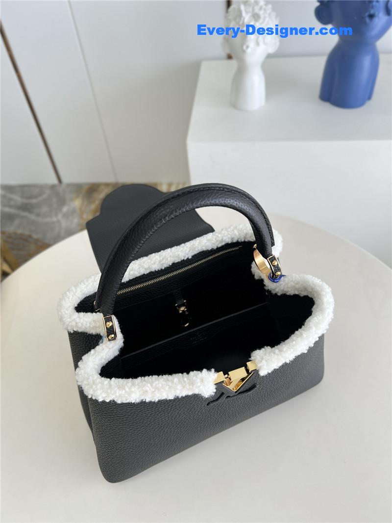 l0vis Vvtt0n lv capucines mm taurillon leather bag