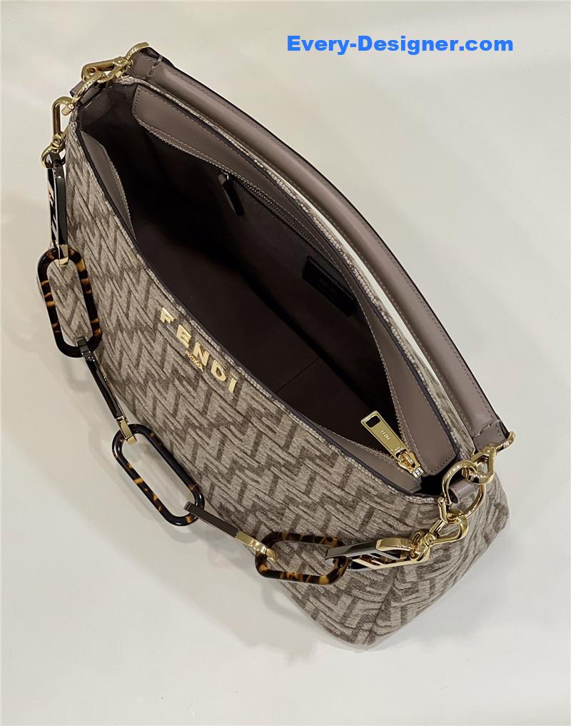 F**di o’clock clutch bag