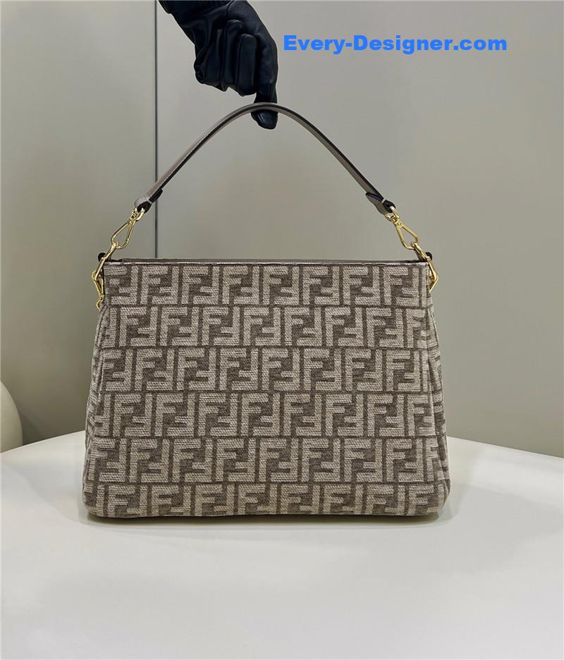 F**di o’clock clutch bag