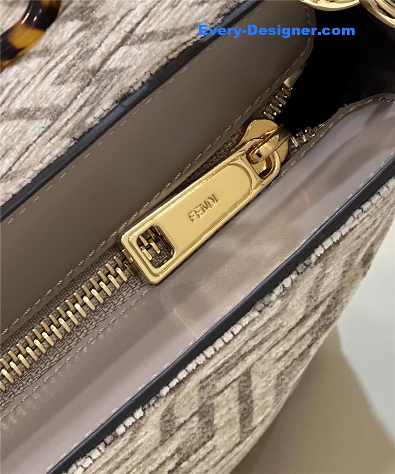 F**di o’clock clutch bag