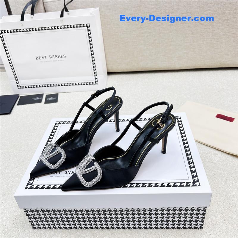 Va1e*ntin0 leather buckle pumps