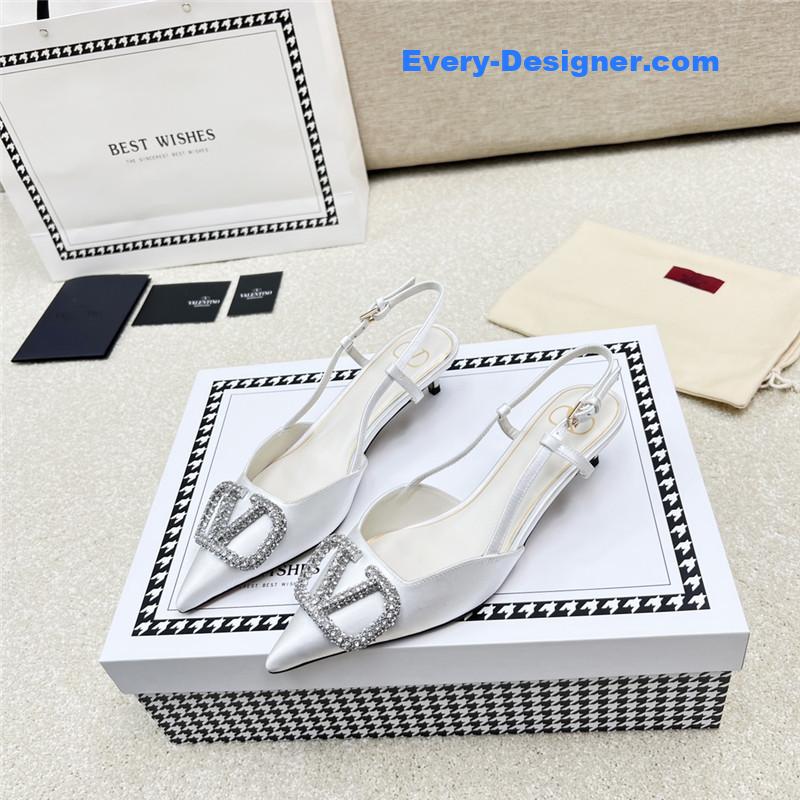 Va1e*ntin0 leather buckle pumps