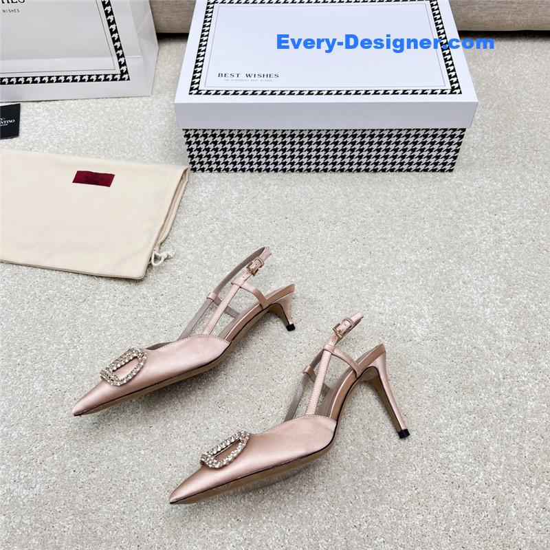 Va1e*ntin0 leather buckle pumps