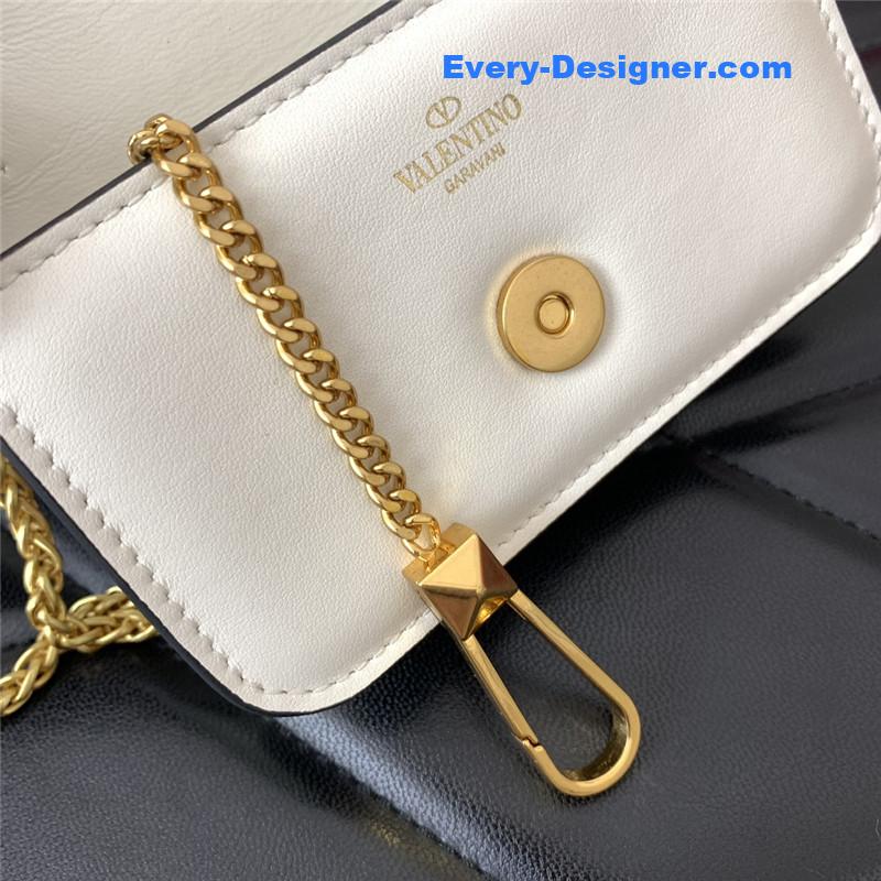 Va1e*ntin0 v logo leather bag