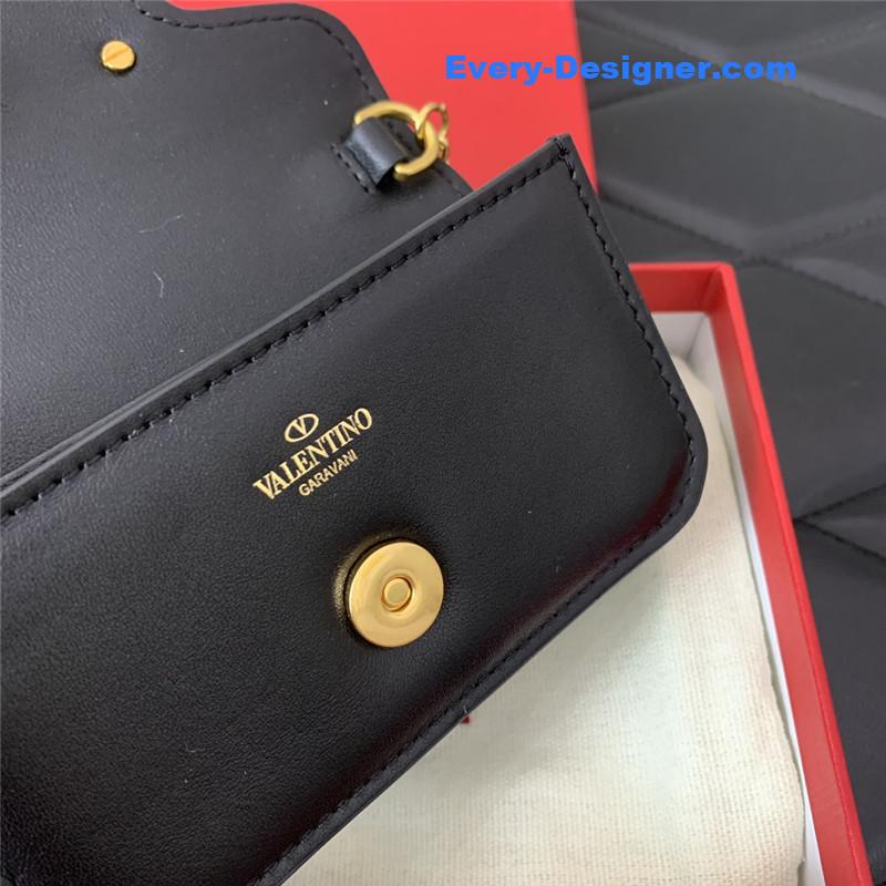 Va1e*ntin0 v logo leather bag