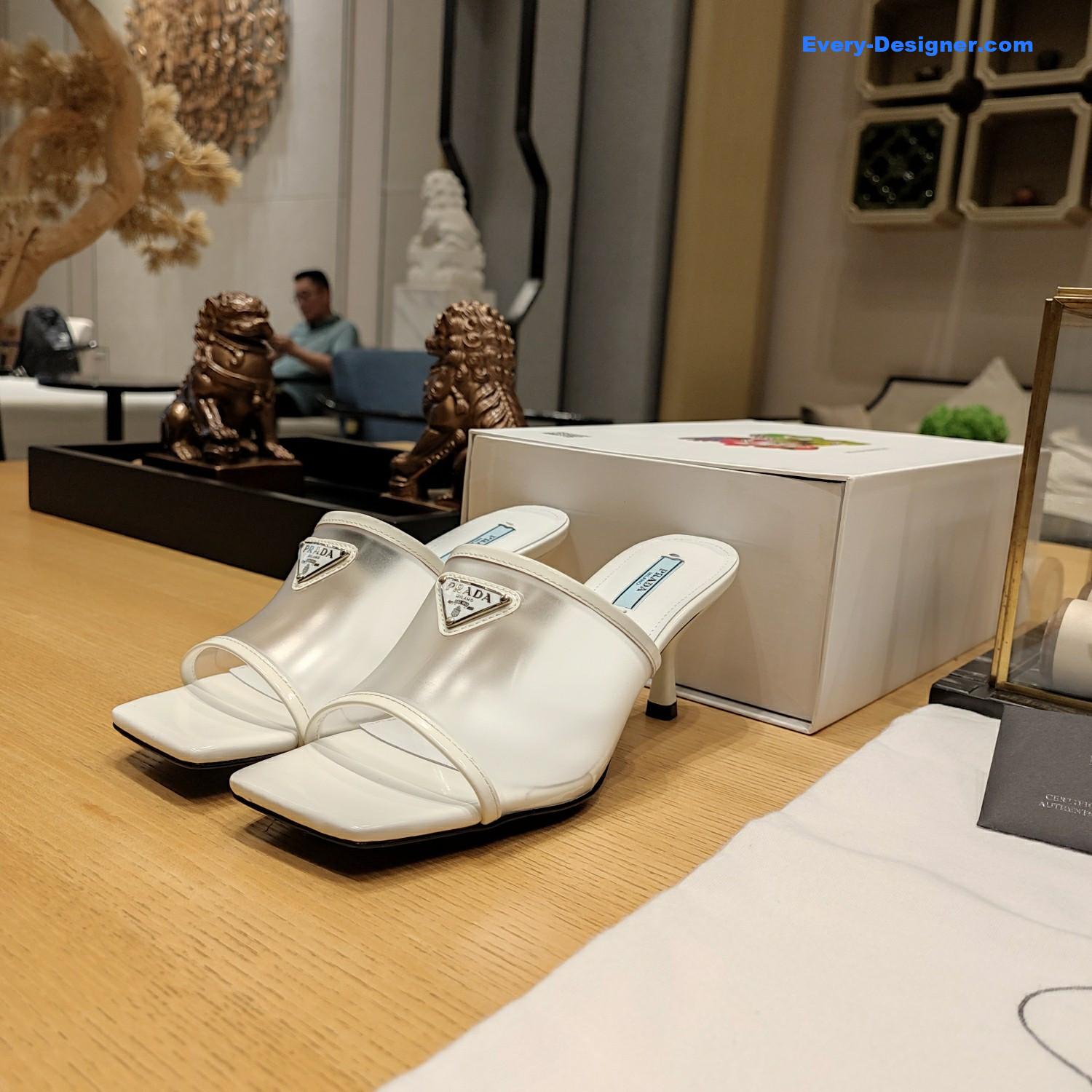 Pra*a metal logo triangle head square sandals