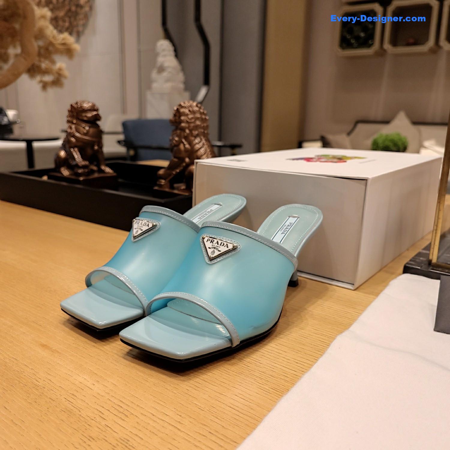 Pra*a metal logo triangle head square sandals