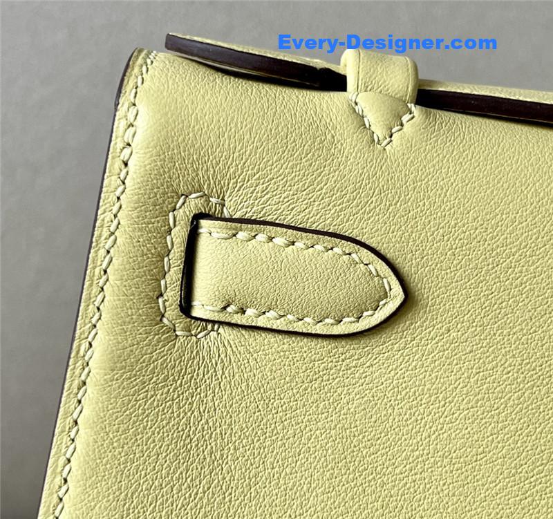 H**me5 kelly pochette swift leather bag