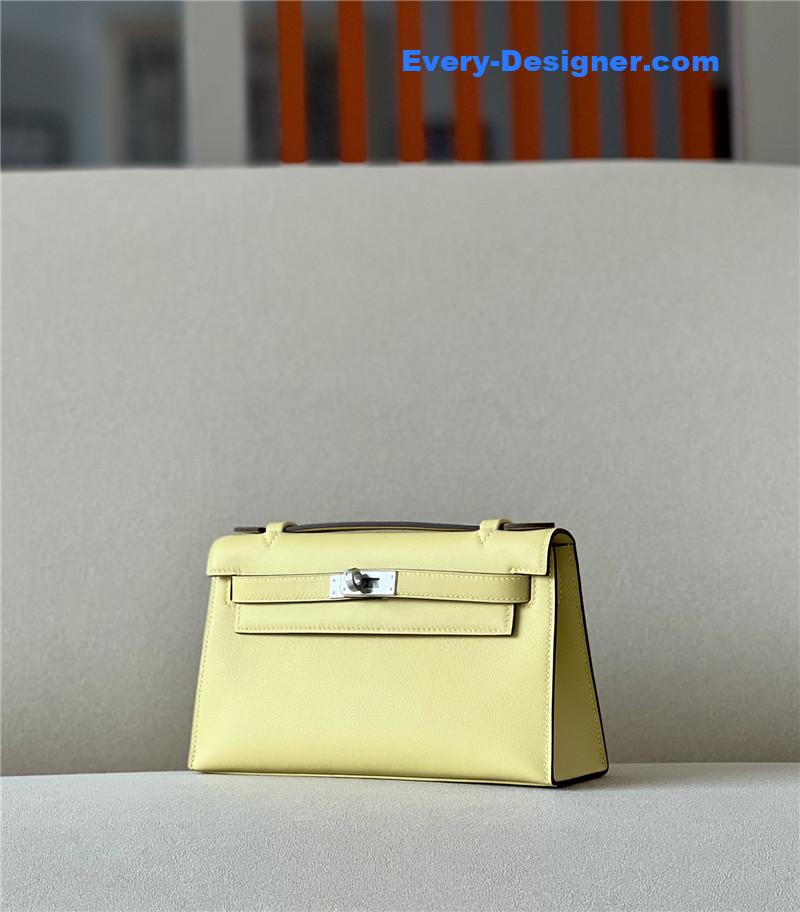 H**me5 kelly pochette swift leather bag