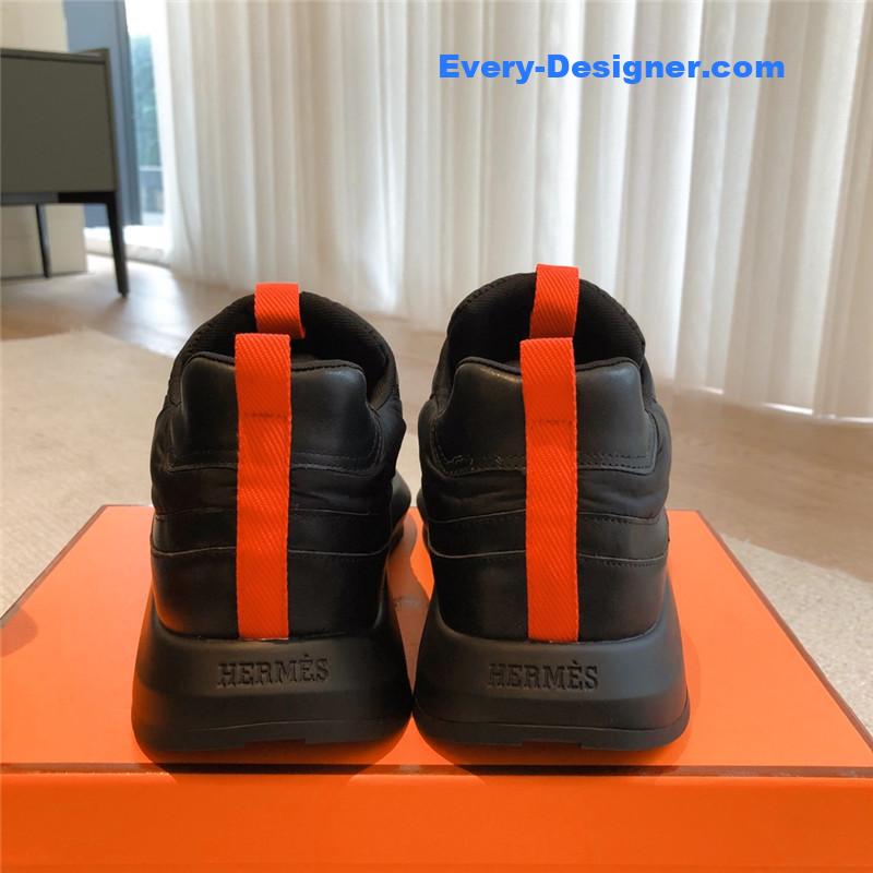 H**me5 black orange bouncing sneakers