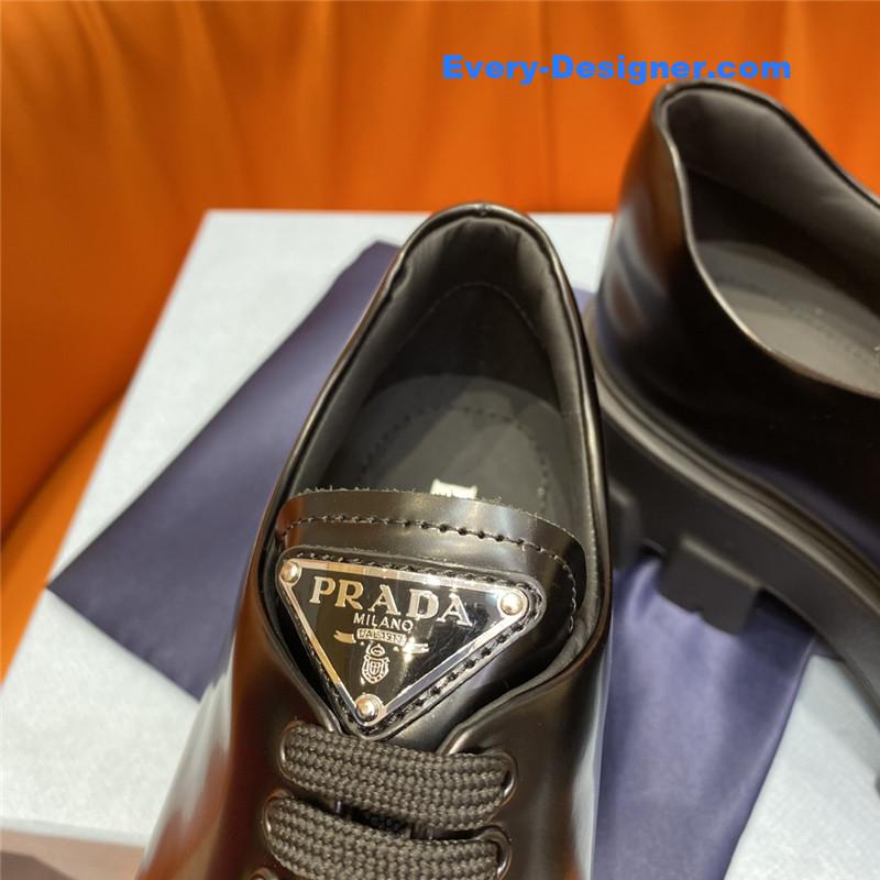 Pra*a triangle logo lace-up loafers