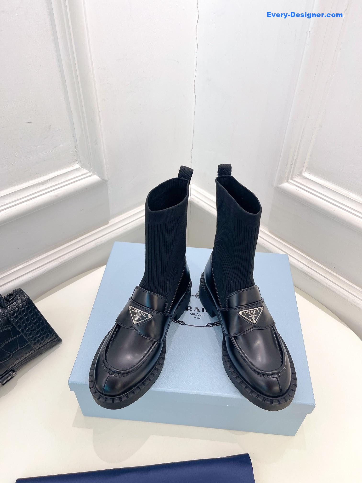 Pra*a catwalk style thick-soled triangle logo socks ankle boots