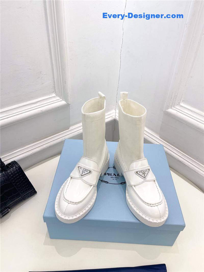 Pra*a catwalk style thick-soled triangle logo socks ankle boots