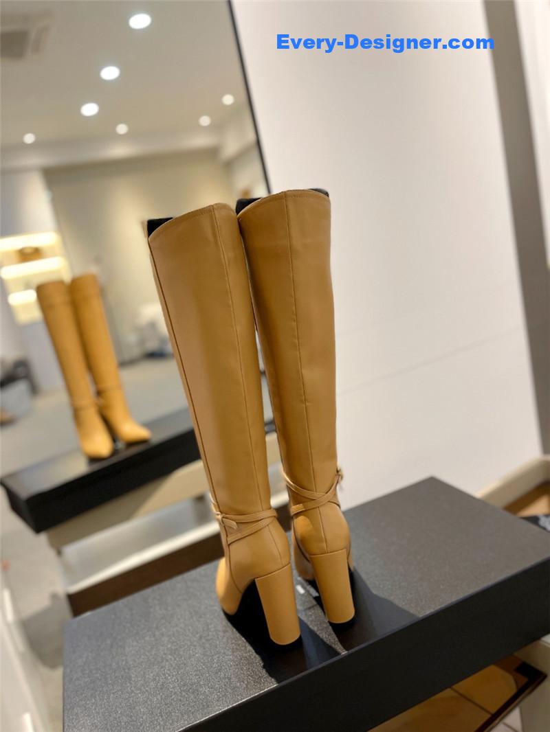 Sa1nt Lau*nt yellow leather knee-high boots