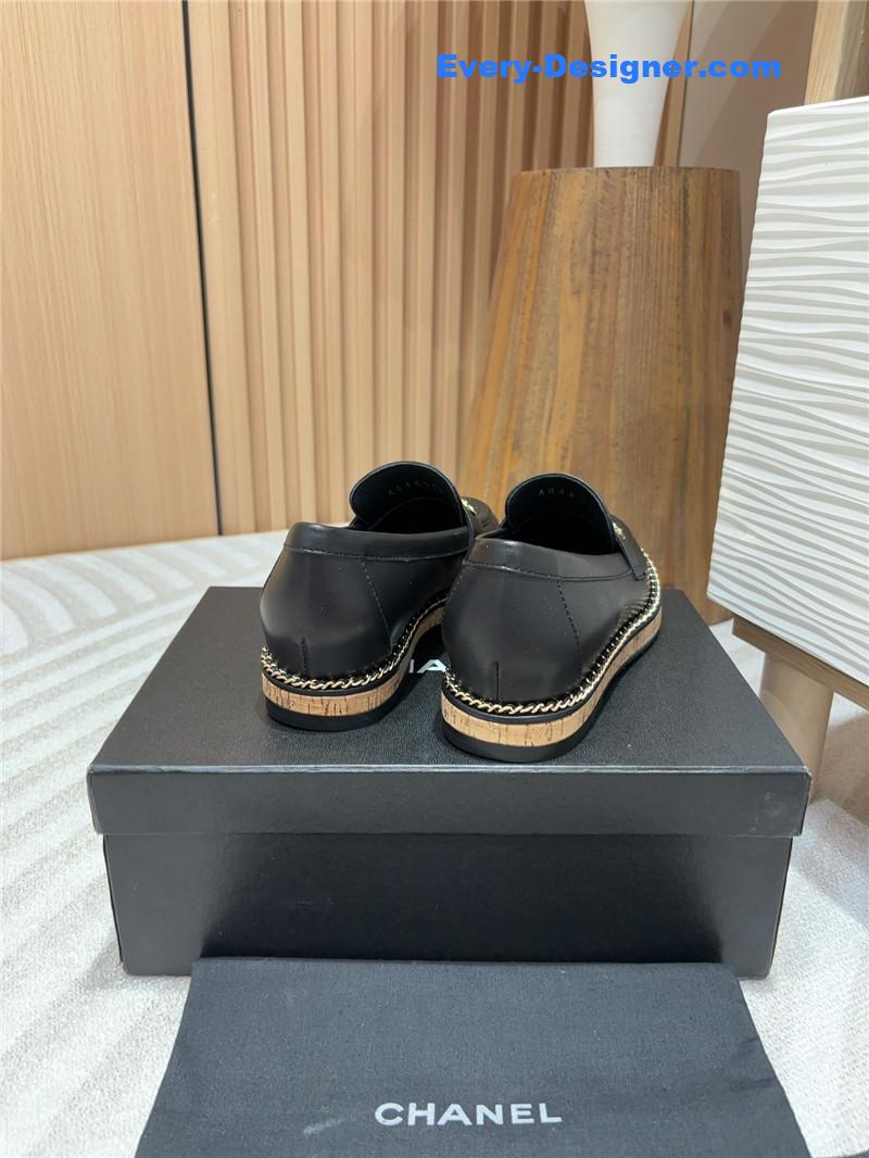 Ch**el metal letter chain trim black calfskin loafers