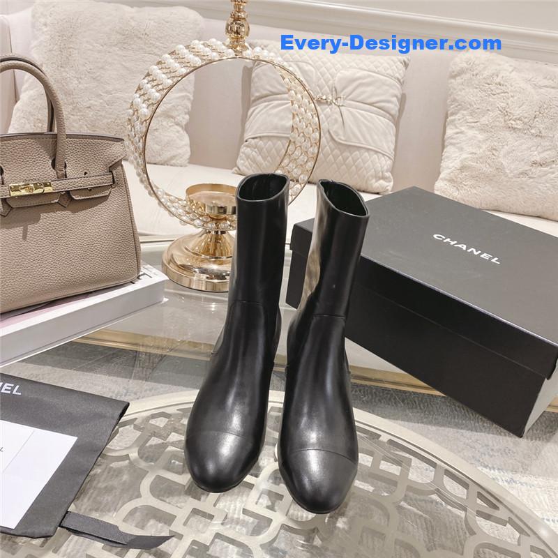 Ch**el black round toe calfskin ankle boots