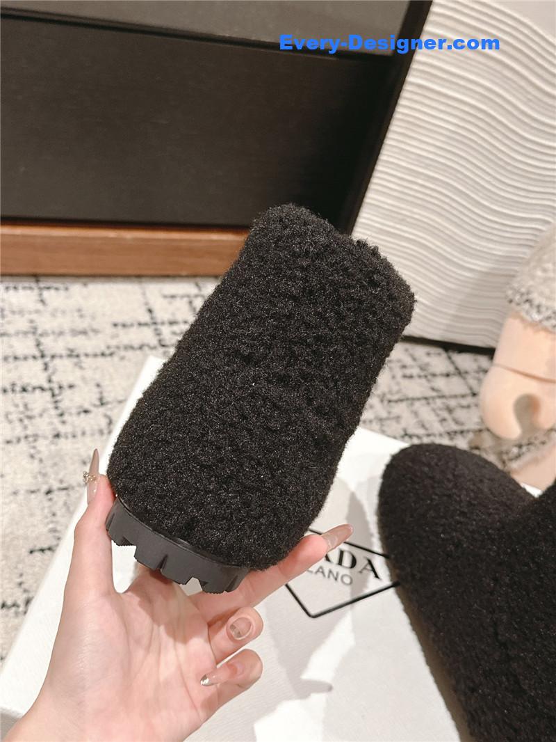 Pra*a black shearling booties