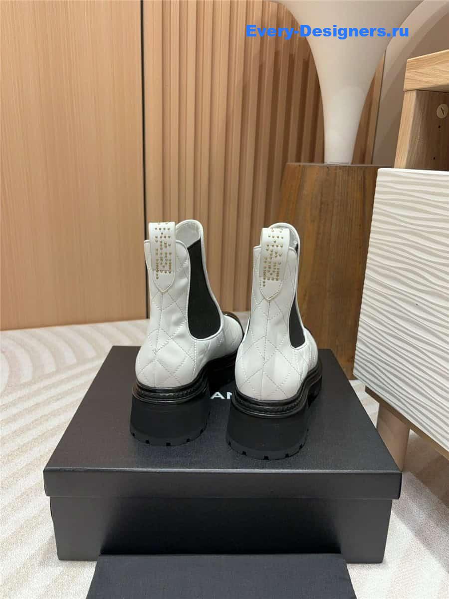 Ch**el white calfskin patent cap toe quilted ankle boots