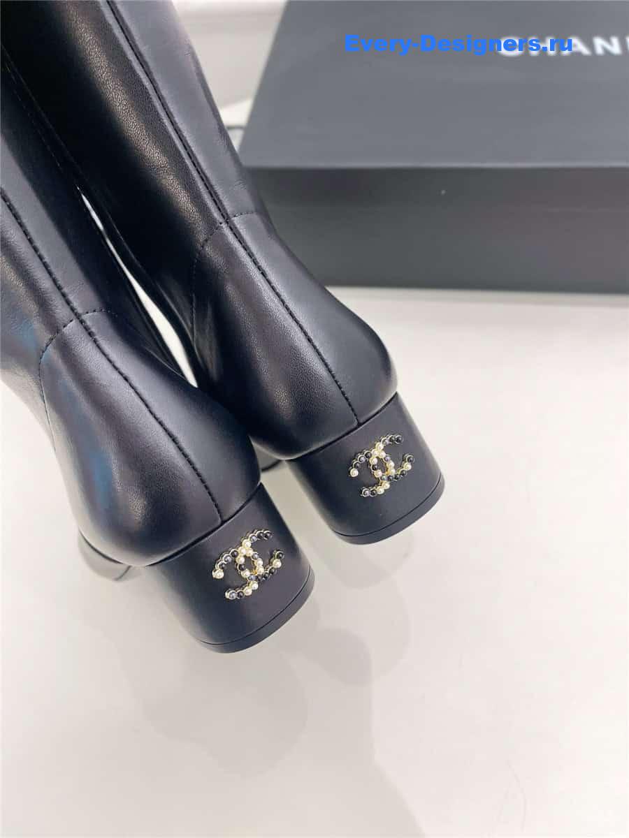 Ch**el black leather heeled boots