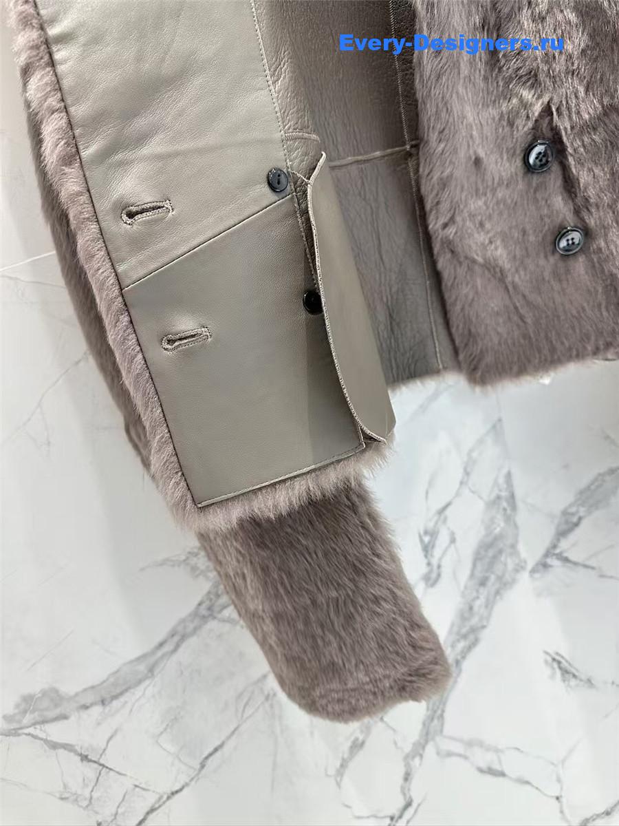 M1um1u long hair lapel sheepskin fur coat