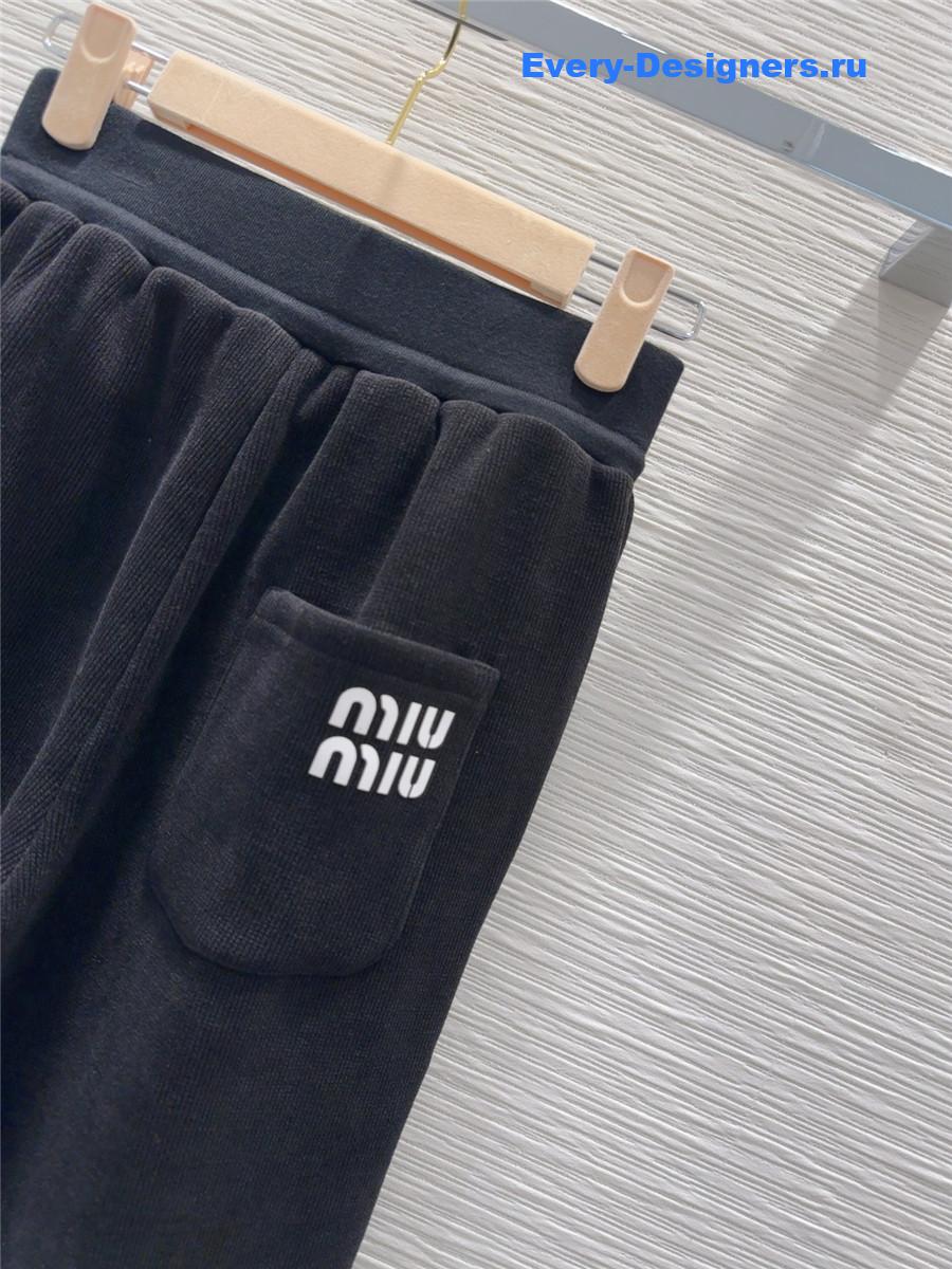 M1um1u new wide-leg trousers