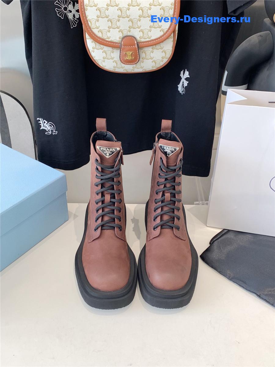 Pra*a calfskin triangle logo brown high top boots