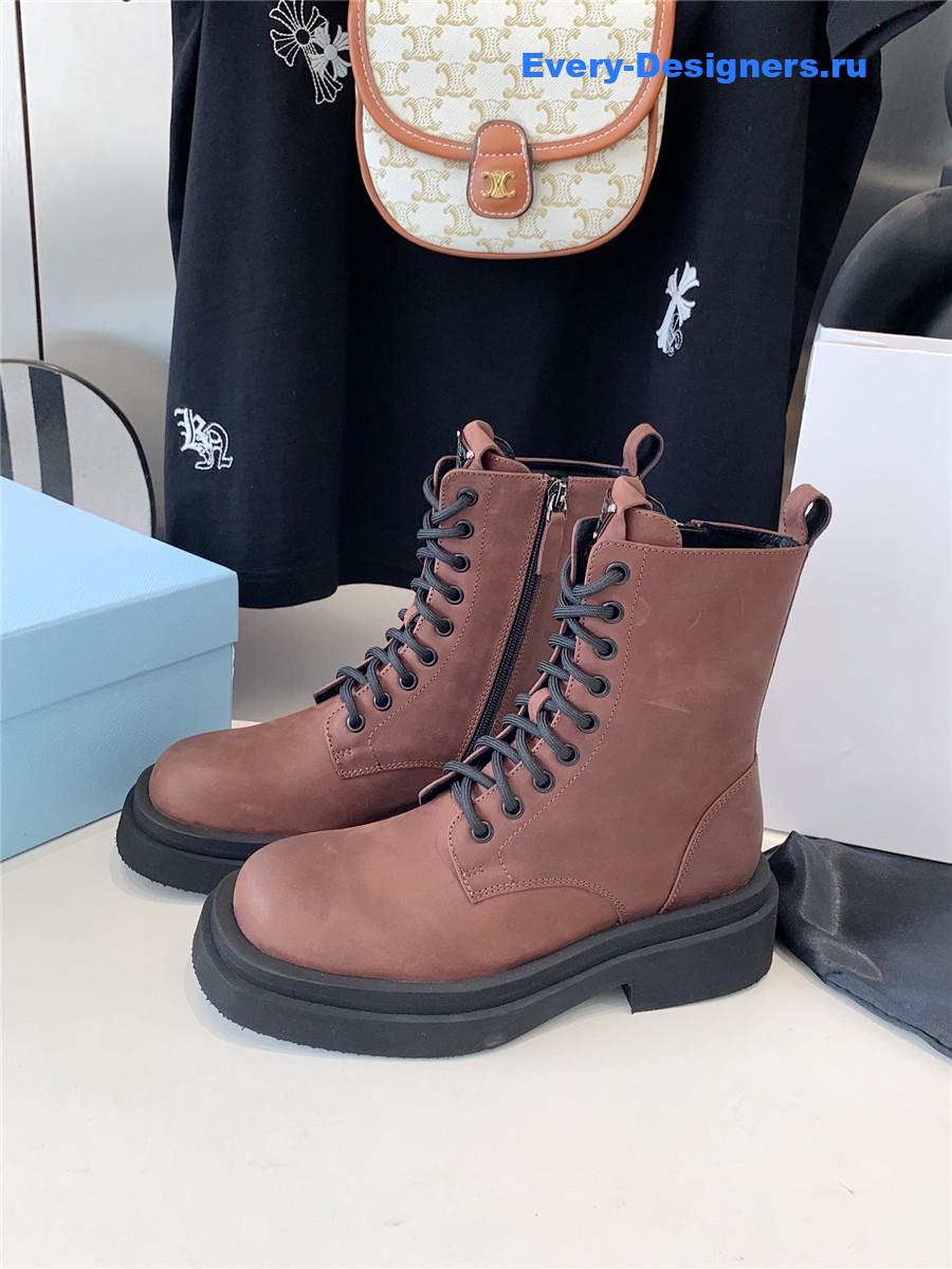 Pra*a calfskin triangle logo brown high top boots