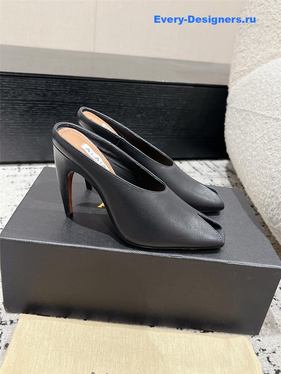 Alaia Black Spike Mules in Calfskin