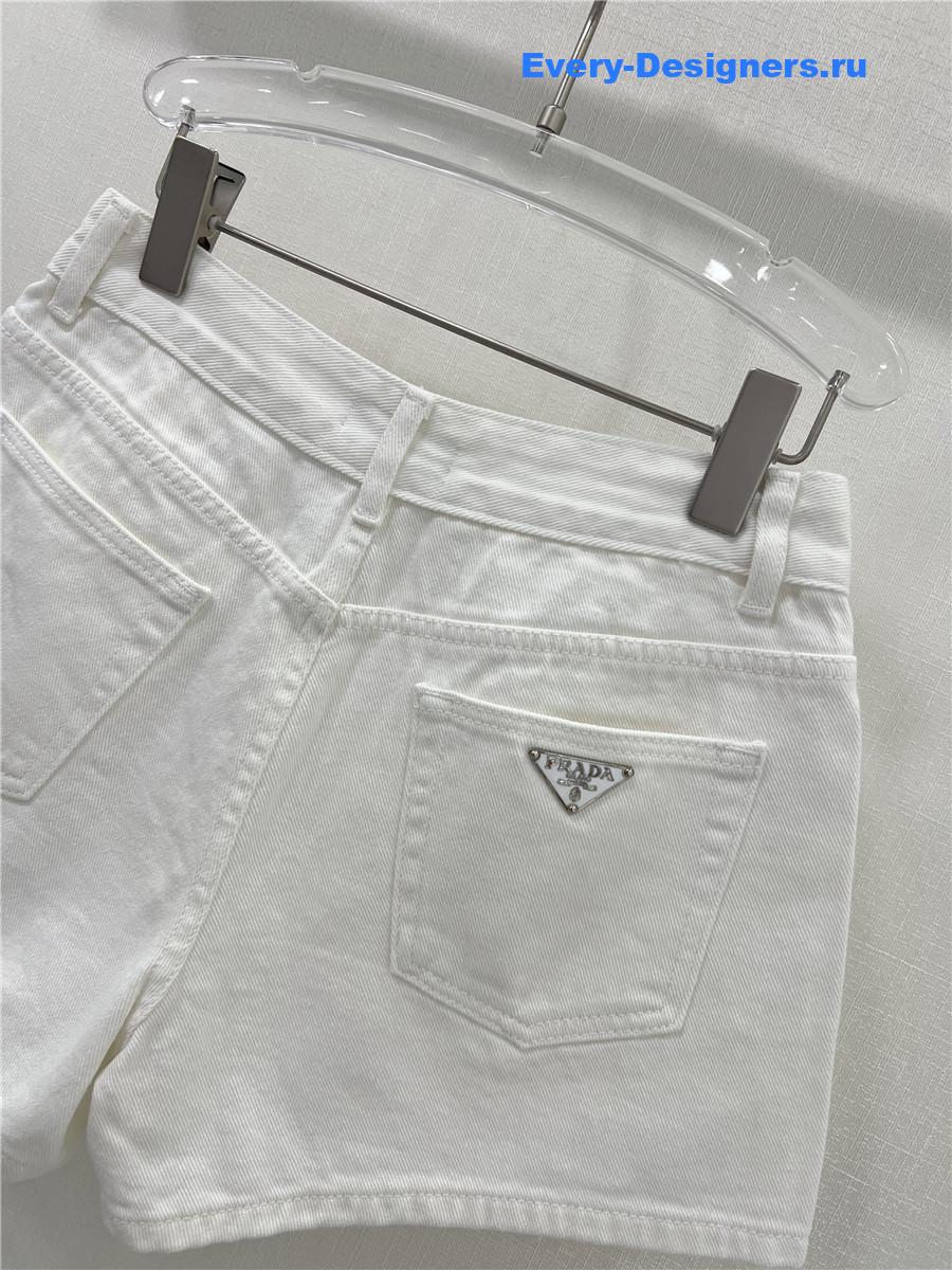 Pra*a high waist washed denim shorts white