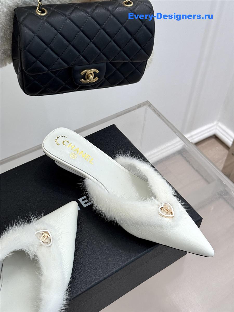 Ch**el rabbit fur pointed toe mules white