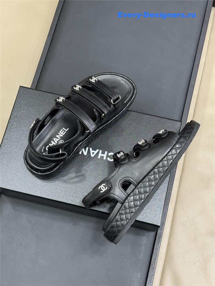 Ch**el black waxed leather sandals
