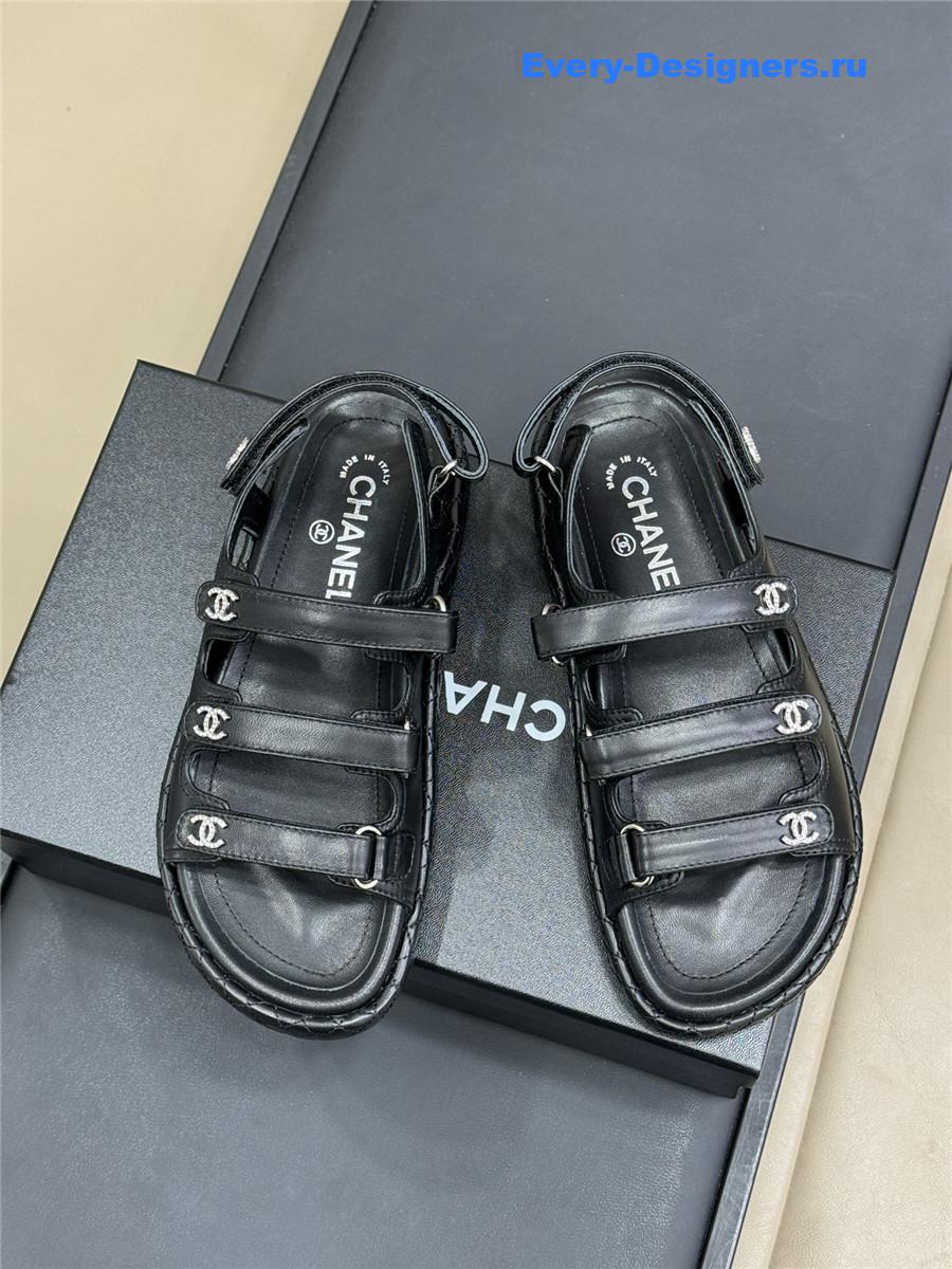 Ch**el black waxed leather sandals