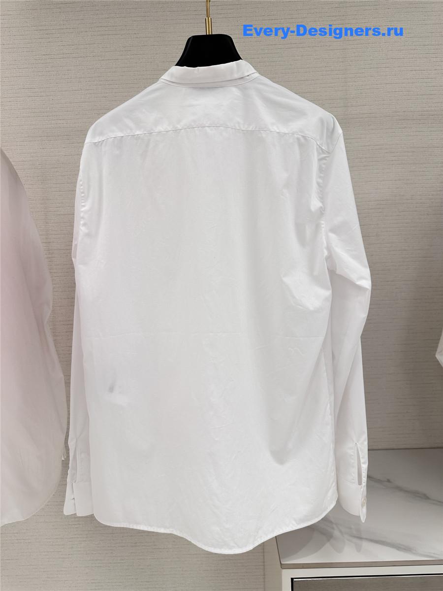 Sa1nt Lau*nt white bow blouse