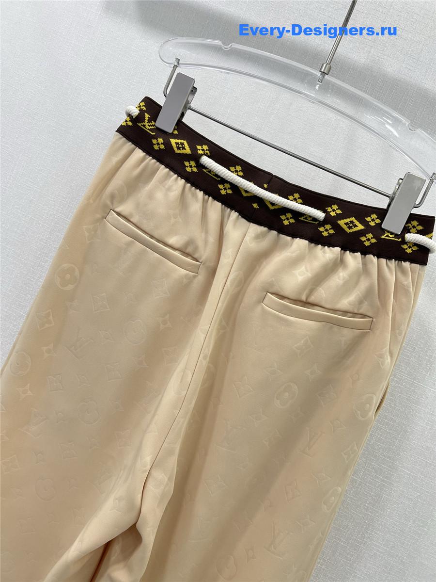 l0vis Vvtt0n beige monogram wide-leg trousers