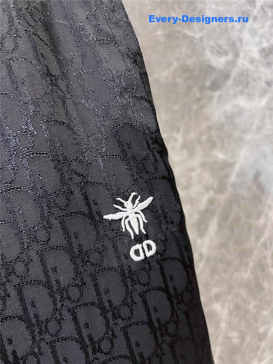 D10r bee embroidered black trousers