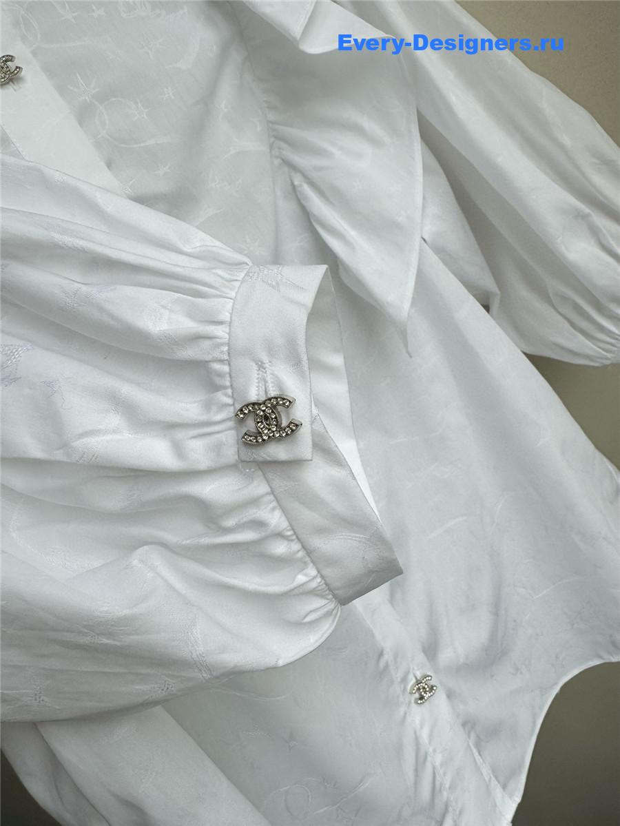 Ch**el white ruffle sleeve shirt
