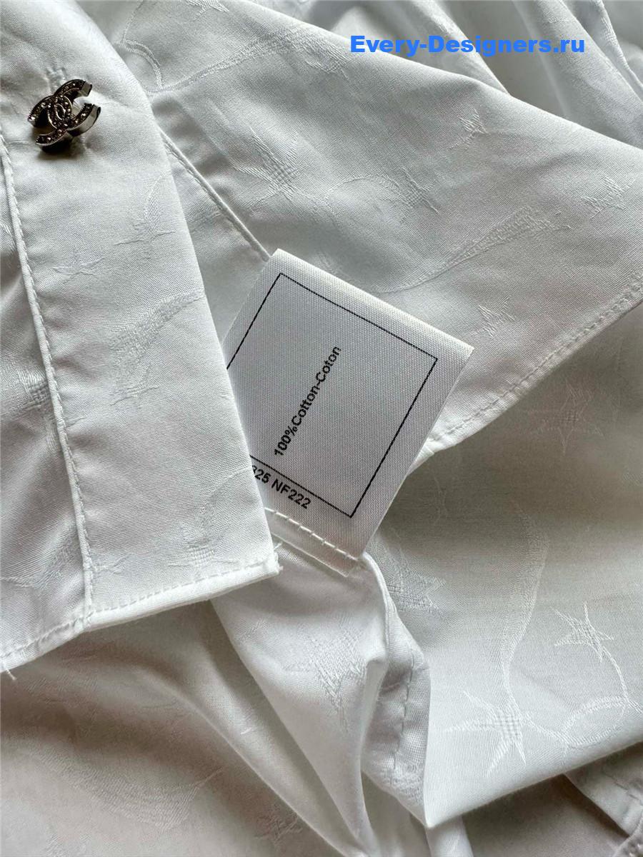 Ch**el white ruffle sleeve shirt