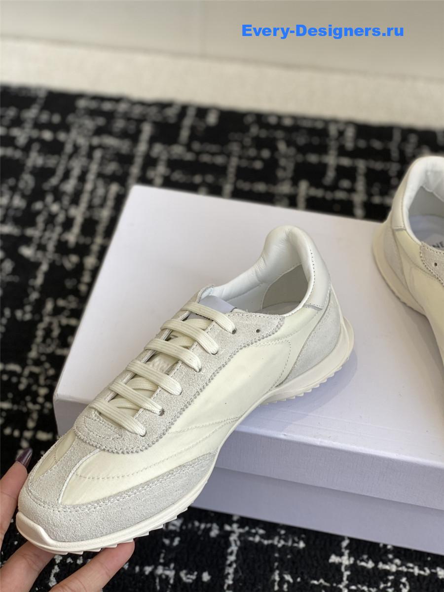 Ce1i*e racer beige low-top sneakers