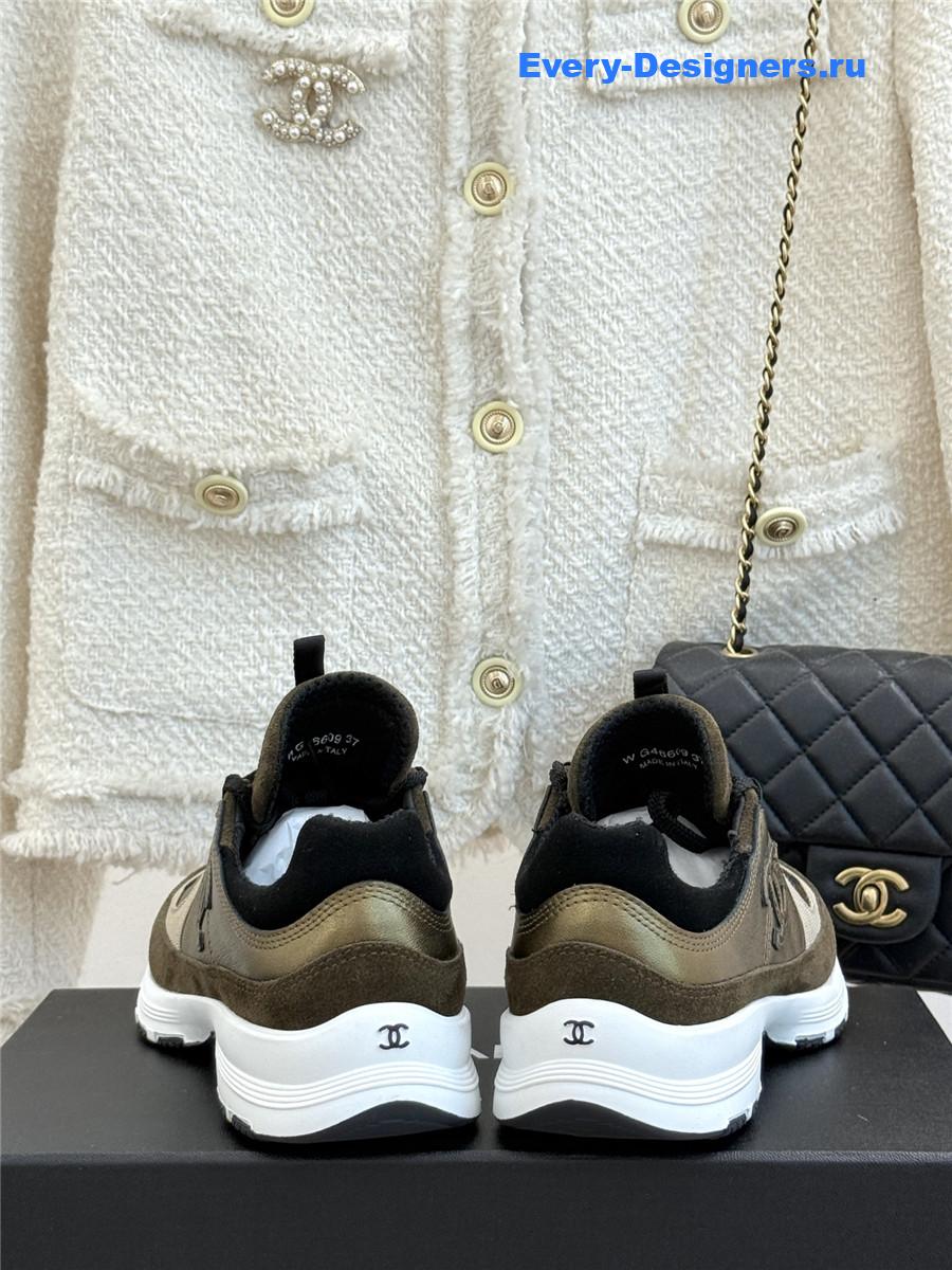 Ch**el laminated calfskin suede gold trainers