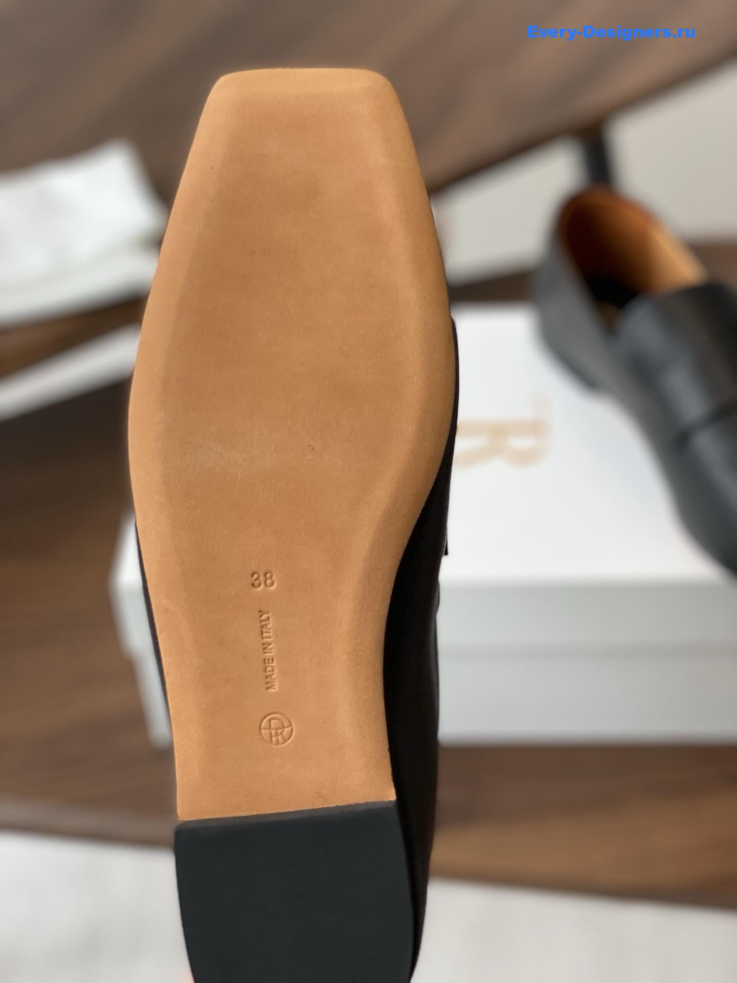 The R0w black square leather loafers