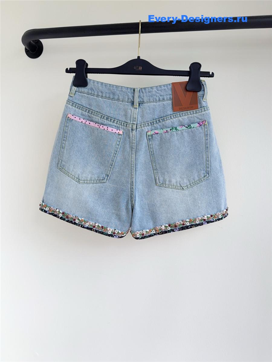 Va1e*ntin0 garavani contrast border denim shorts