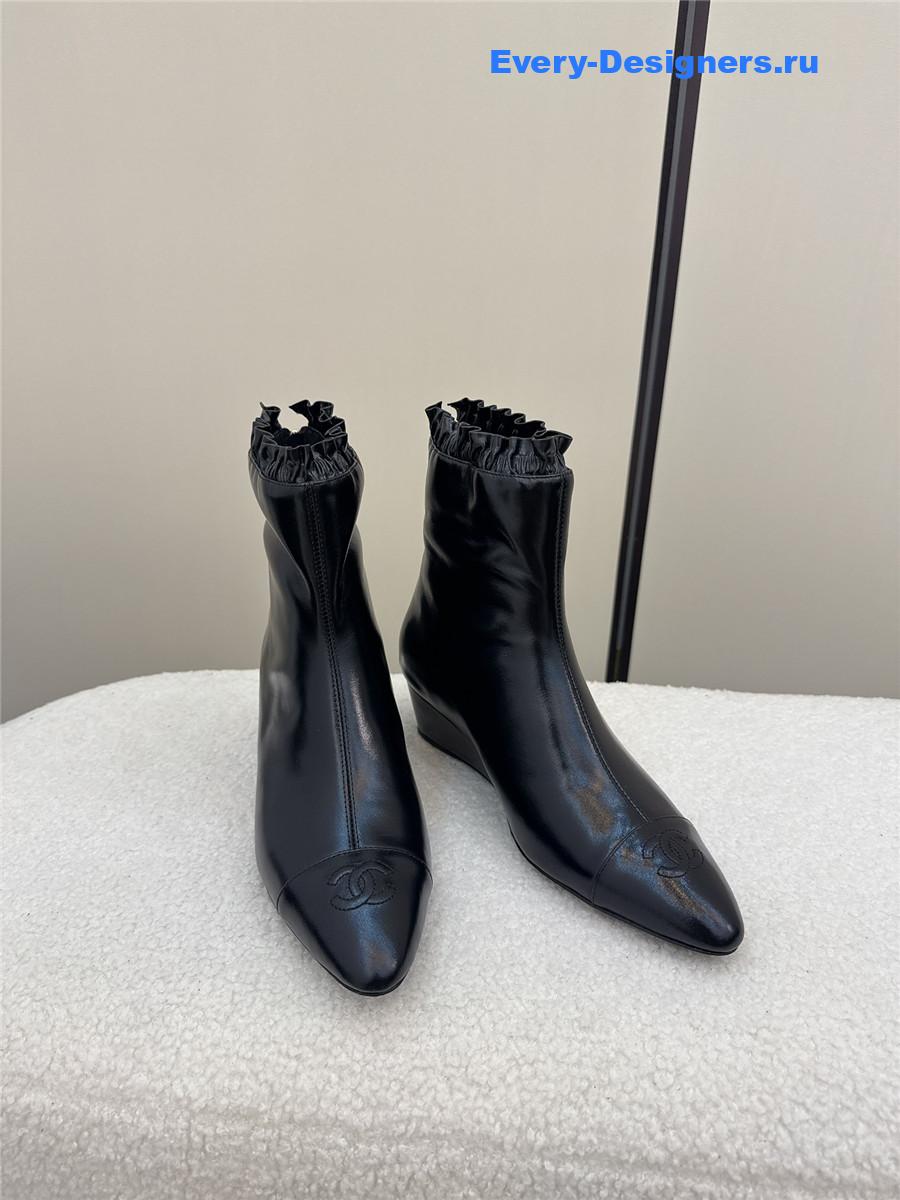 Ch**el black pointed wedge ankle boots