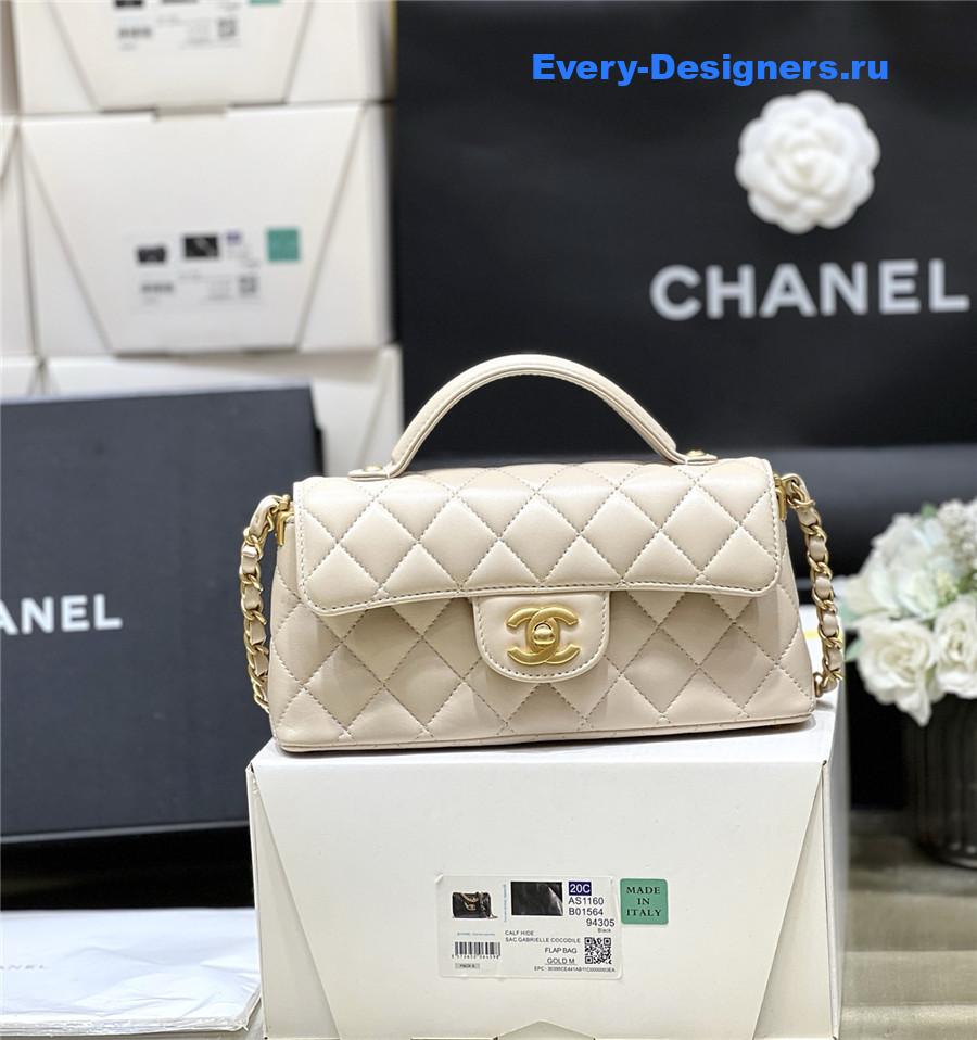 Ch**el beige lambskin top handle flap bag