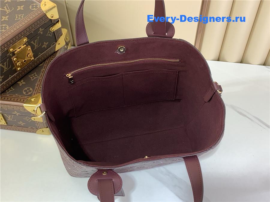l0vis Vvtt0n all in one monogram empreinte leather bag