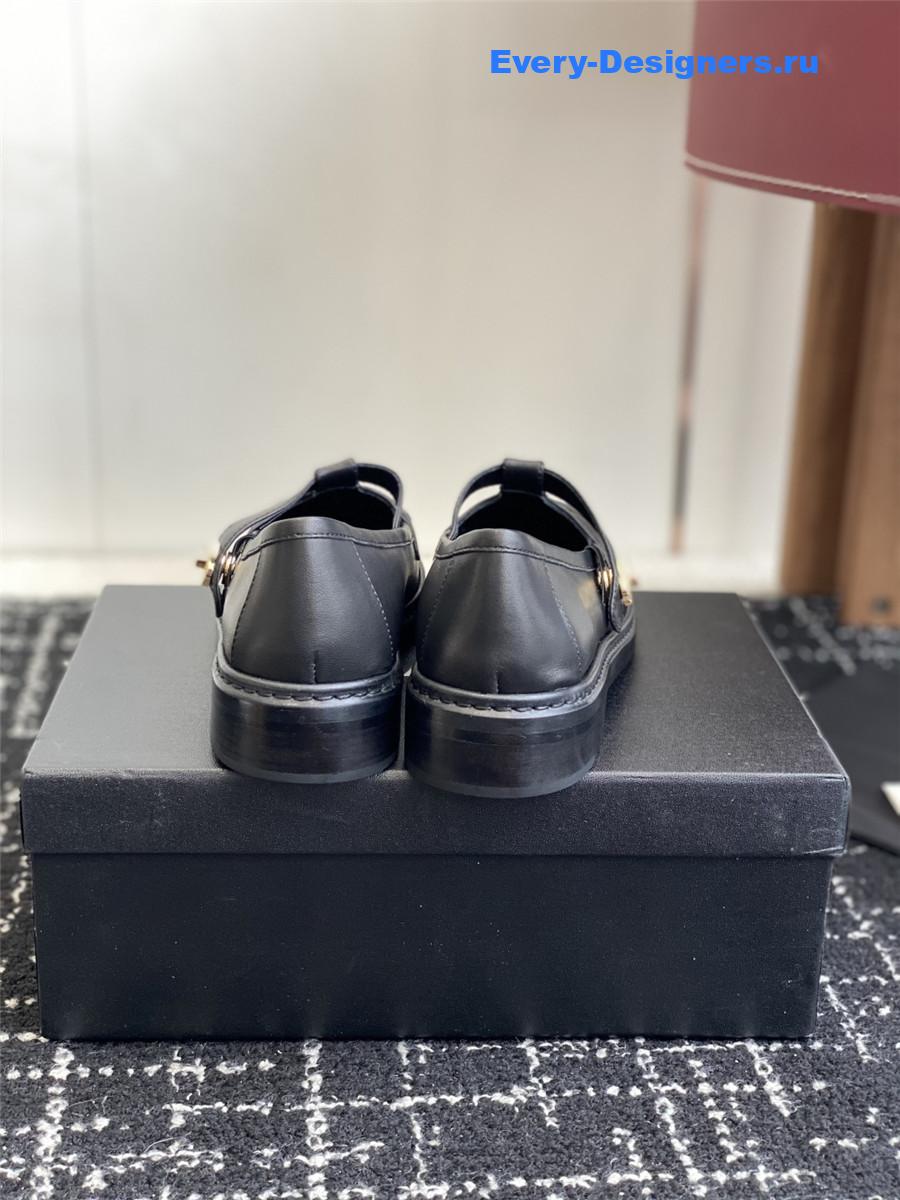 Ch**el black calfskin moccasins