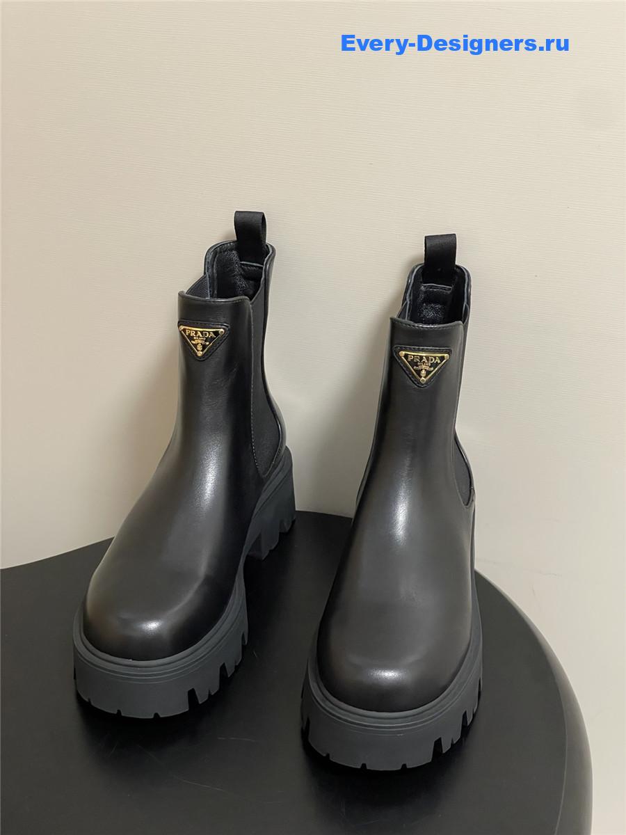 Pra*a black monolith brushed leather booties